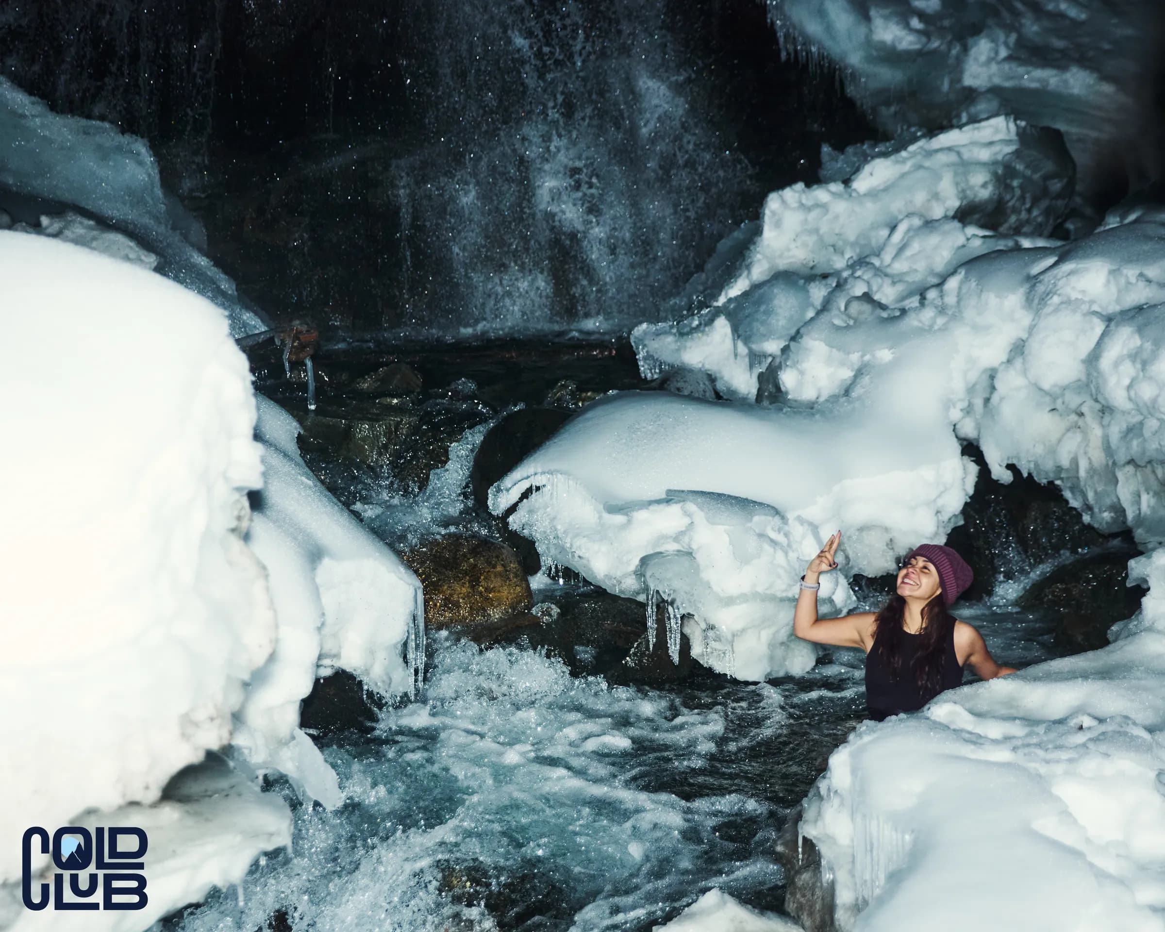 Immersion beneath frozen falls